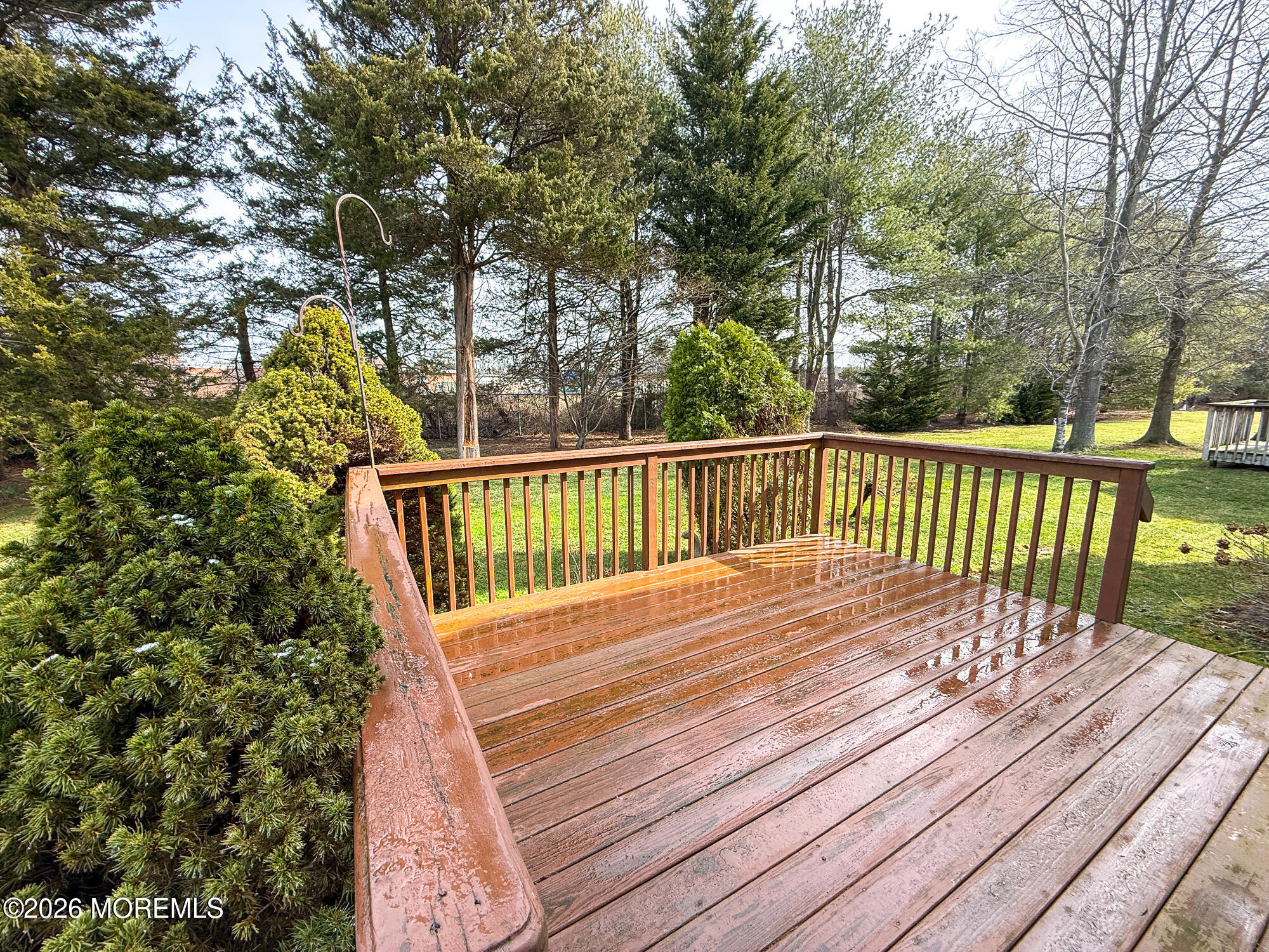 155 Wordsworth Road Brick, NJ 08724 - Photo 32 of 42 a balcony with wooden floor and fence