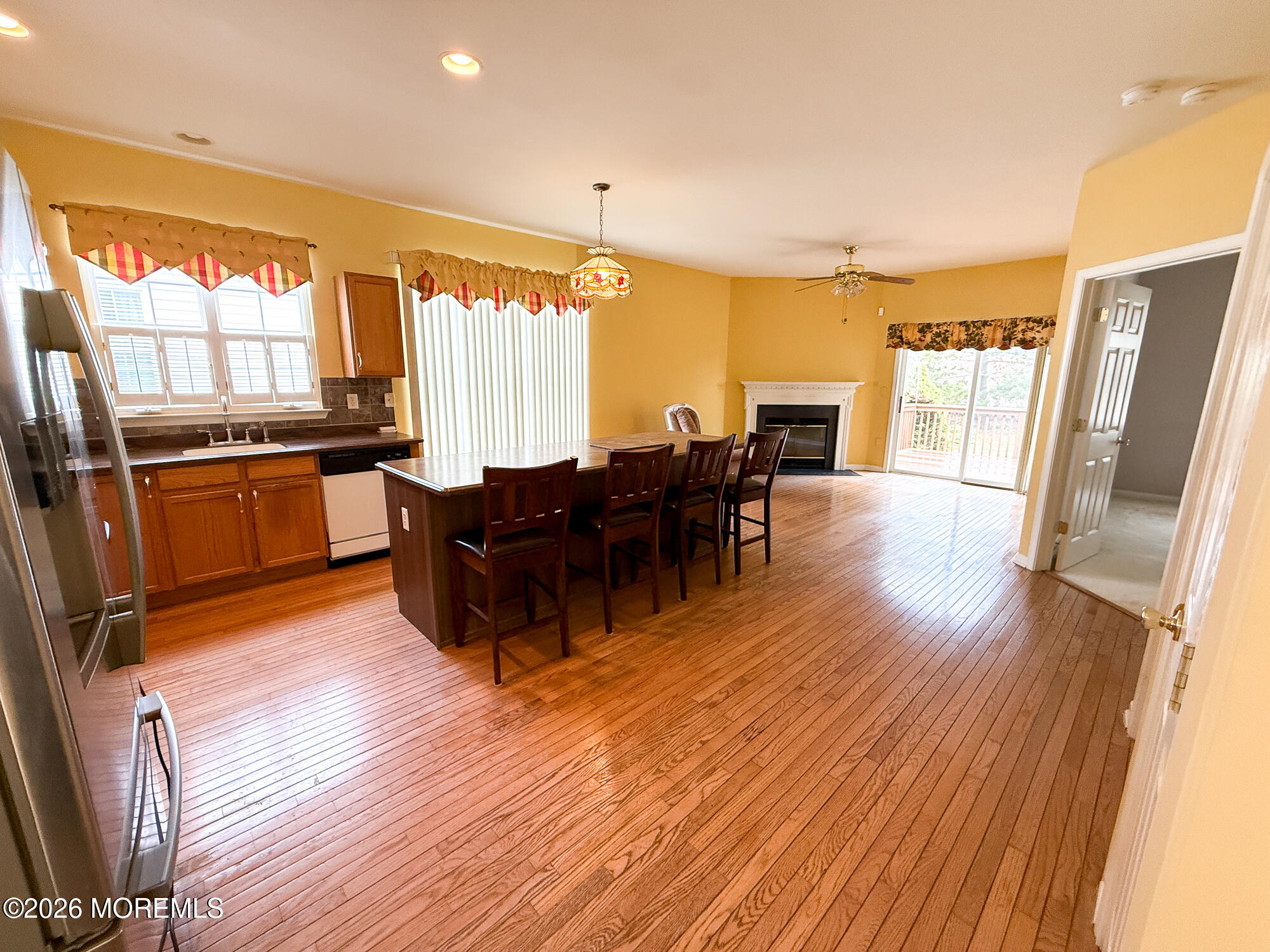 155 Wordsworth Road Brick, NJ 08724 - Photo 10 of 42 a living room with stainless steel appliances granite countertop furniture wooden floor and a view of kitchen