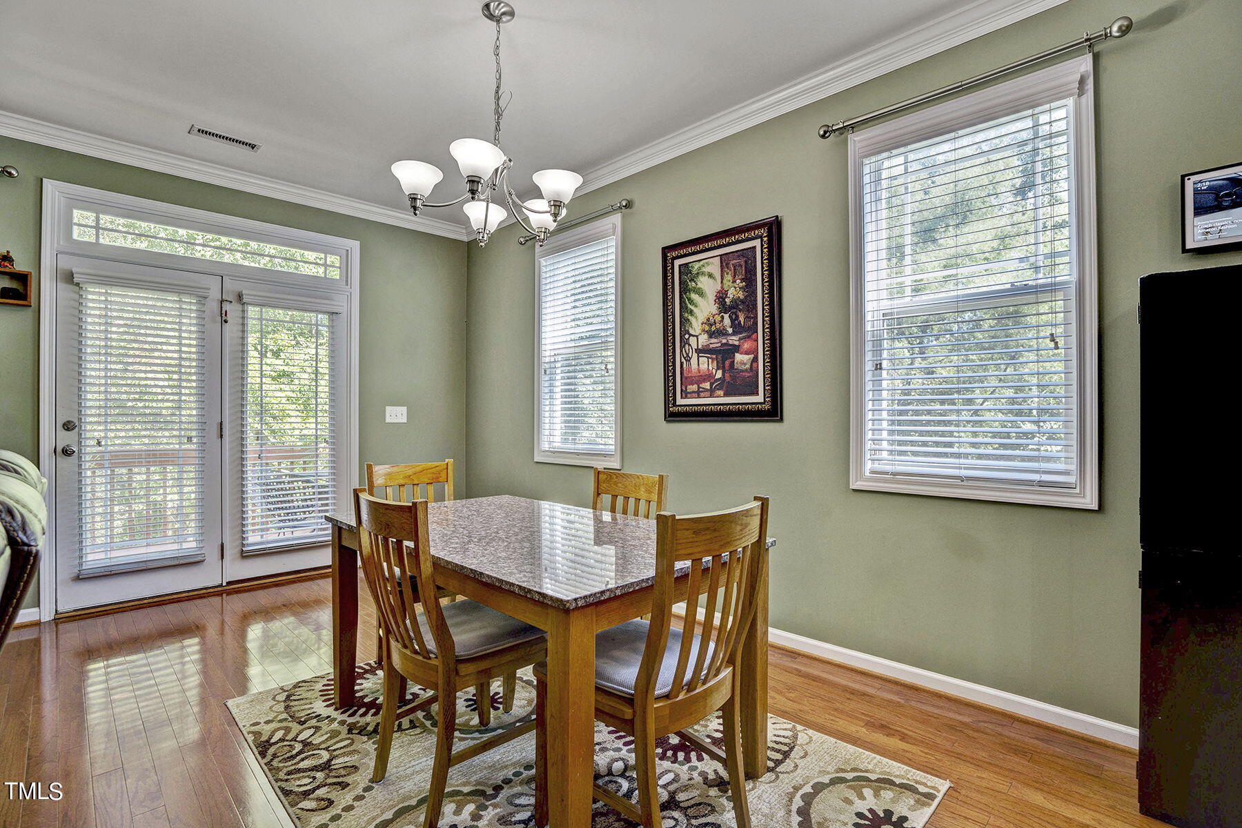 4630 Altha Street Raleigh, NC 27606 - Photo 16 of 31 a view of a dining room with furniture window and outside view