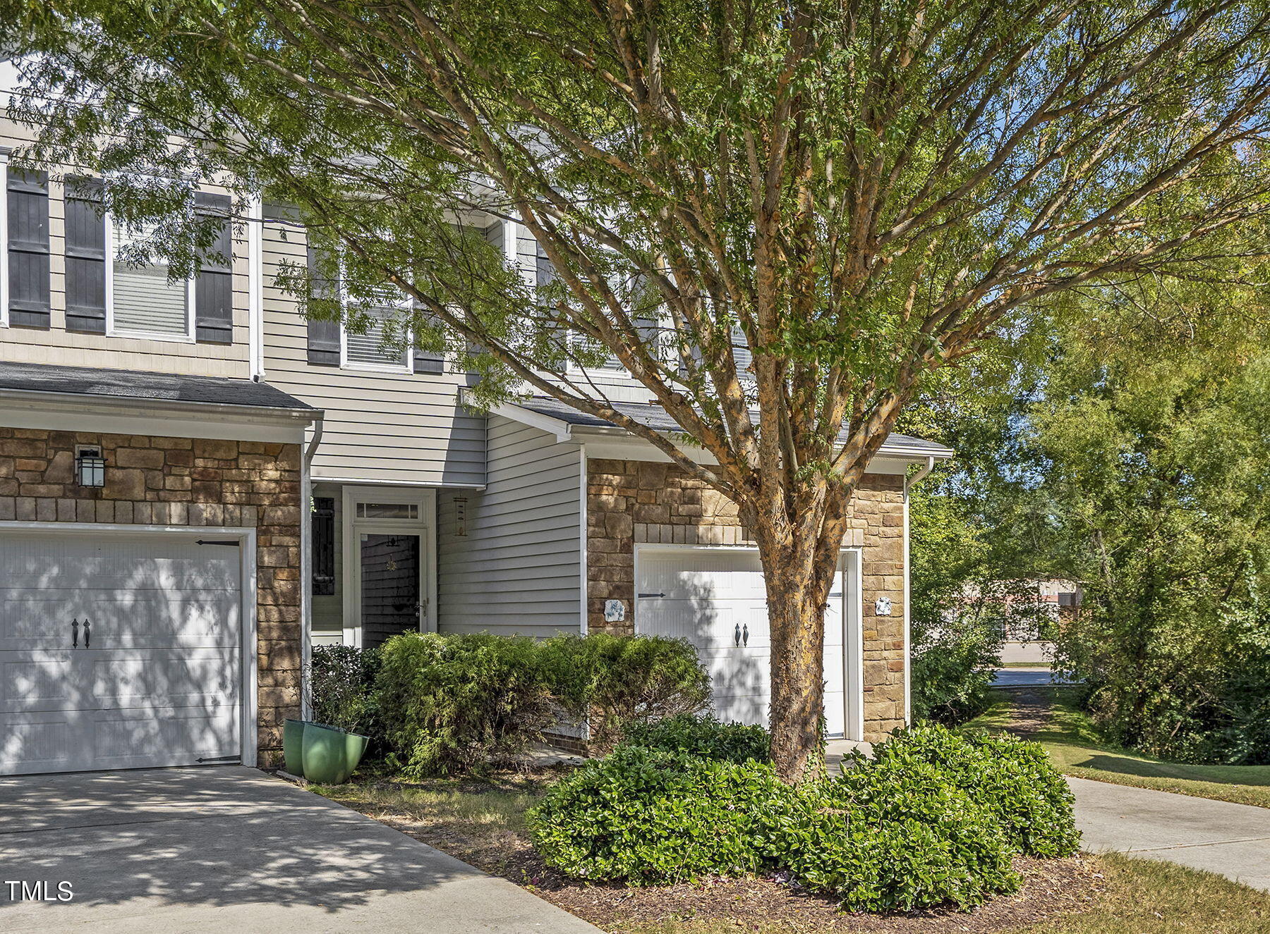 4630 Altha Street Raleigh, NC 27606 - Photo 2 of 31 a front view of a house with garden