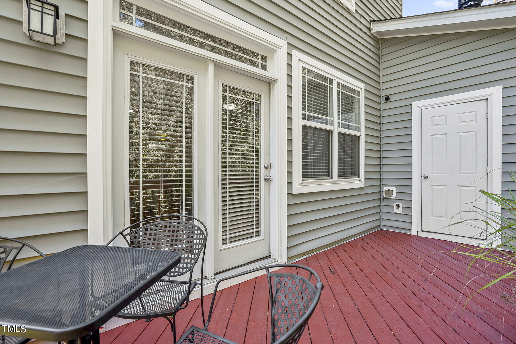 4630 Altha Street Raleigh, NC 27606 - Photo 27 of 31 a view of a house with a chairs and table in a patio