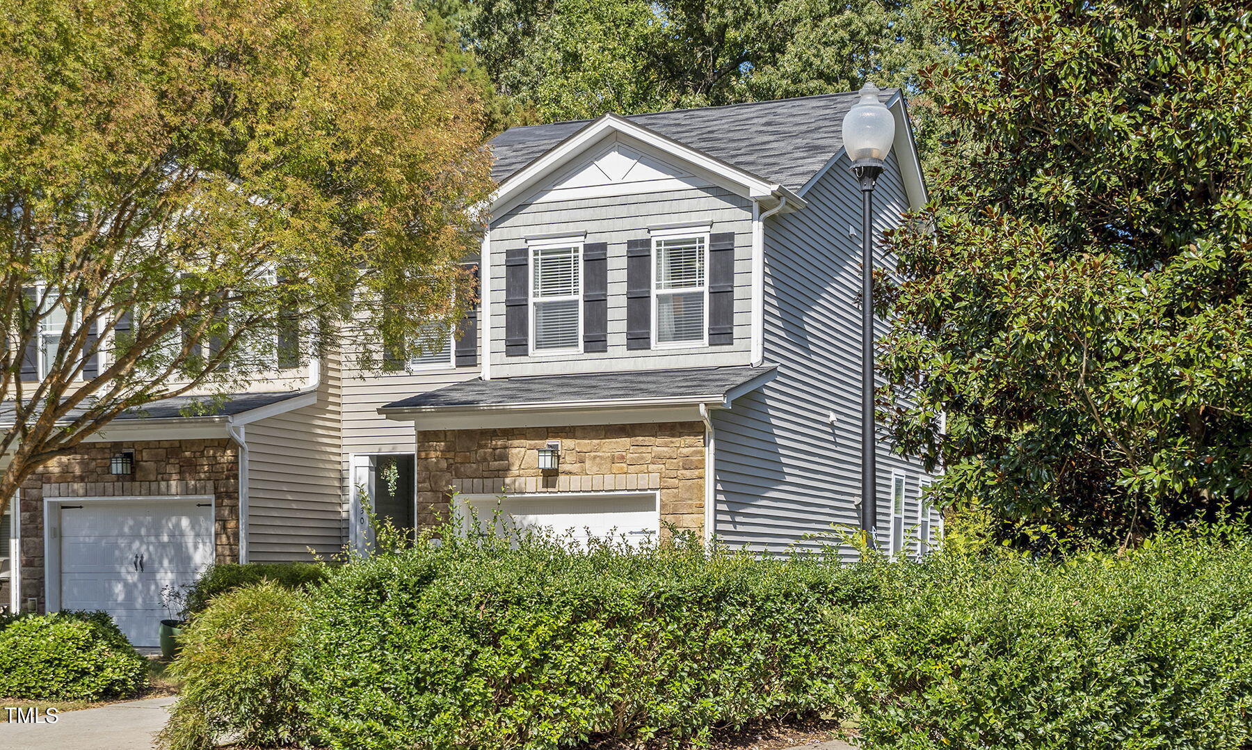 4630 Altha Street Raleigh, NC 27606 - Photo 3 of 31 a front view of a house with a yard