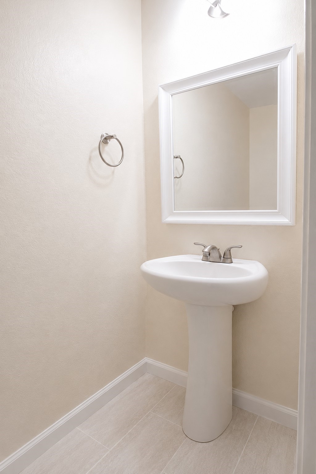 5612 Rainflower Terrace Lane Spring, TX 77389 - Photo 27 of 50 a bathroom with a sink a mirror and shower
