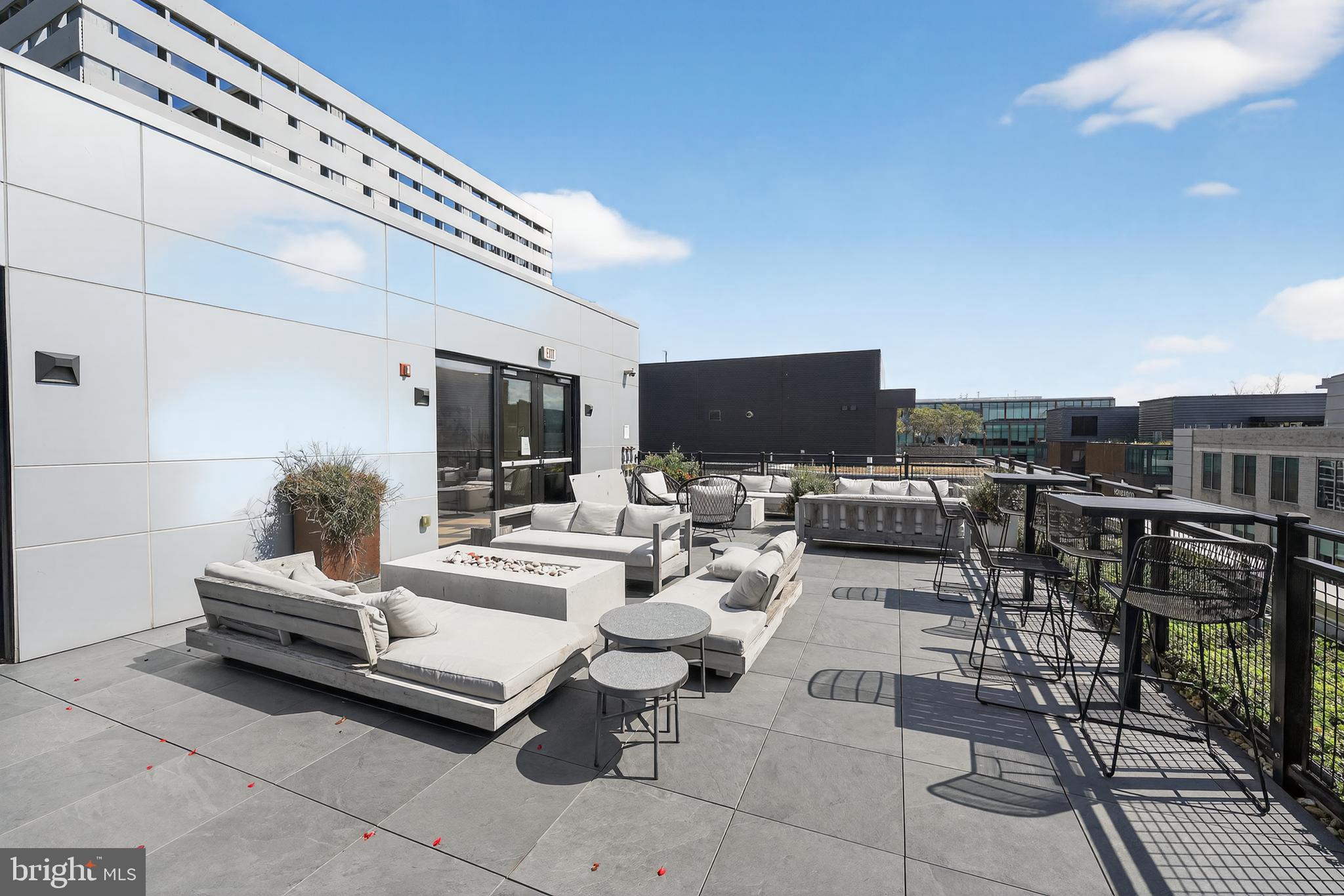 37 L Street Southeast, Unit A701 Washington, DC 20003 - Photo 29 of 45 a outdoor space with lots of tables and chairs