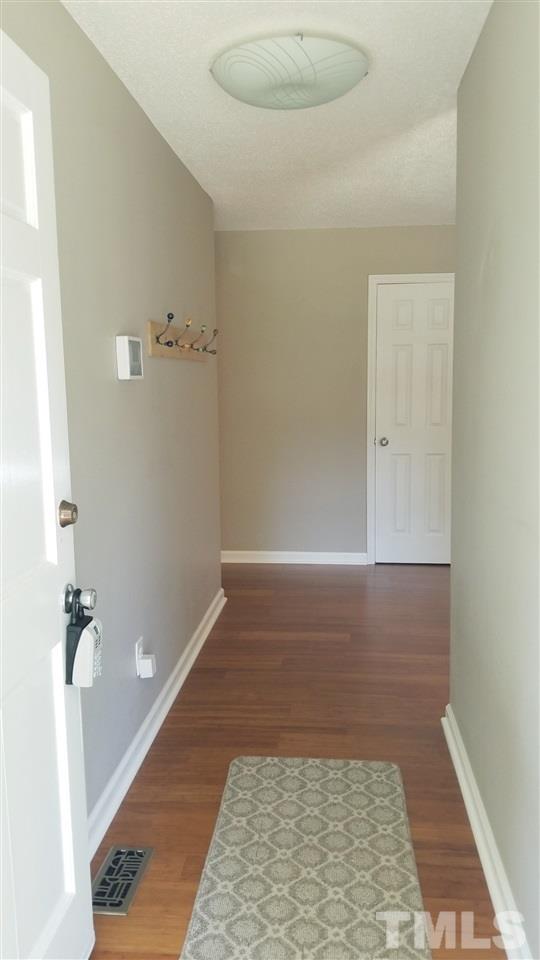 810 Wyldewood Road Durham, NC 27704 - Photo 2 of 23 a bathroom with a shower