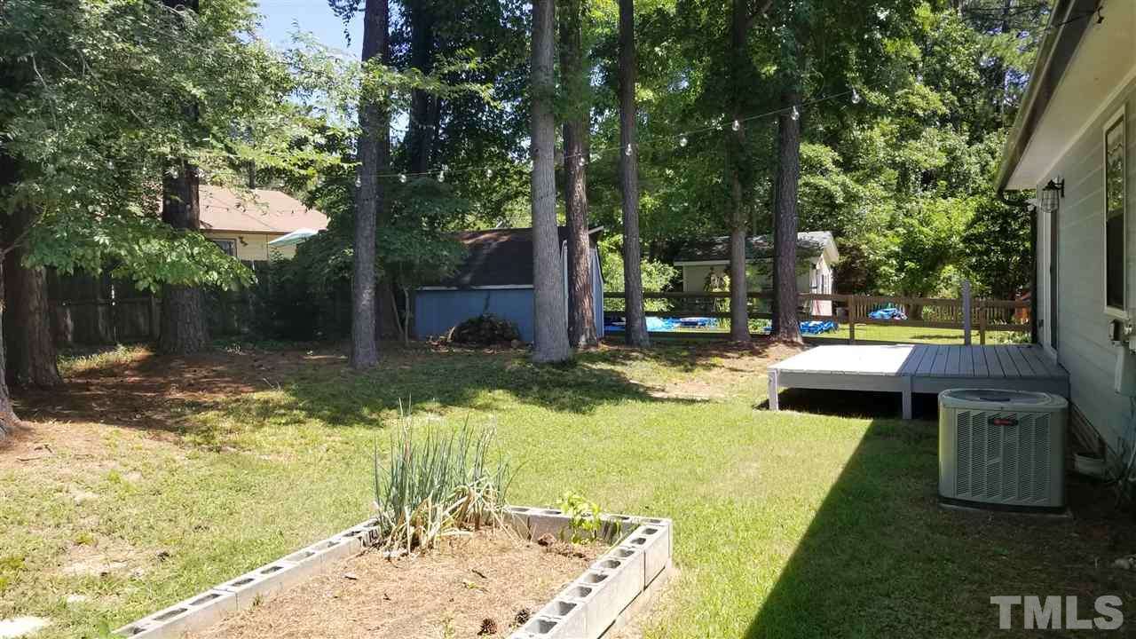 810 Wyldewood Road Durham, NC 27704 - Photo 18 of 23 a view of a swimming pool with a patio
