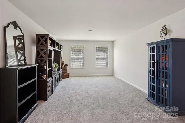 a view of livingroom with furniture and closet