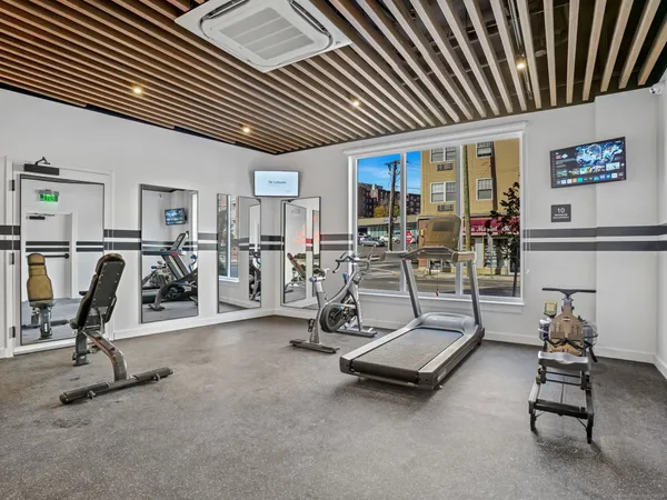 a view of a room with gym equipment