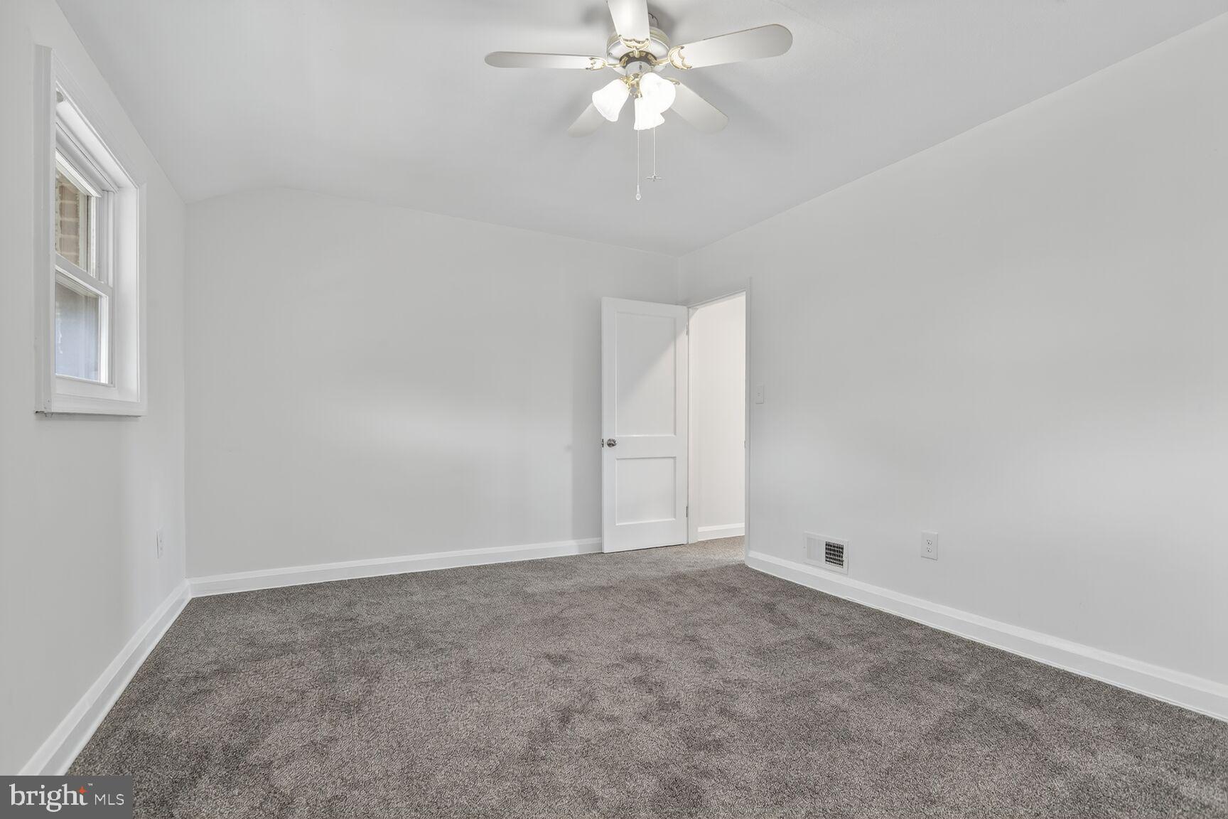 8258 Kavanagh Road Baltimore, MD 21222 - Photo 13 of 19 a view of an empty room with a window