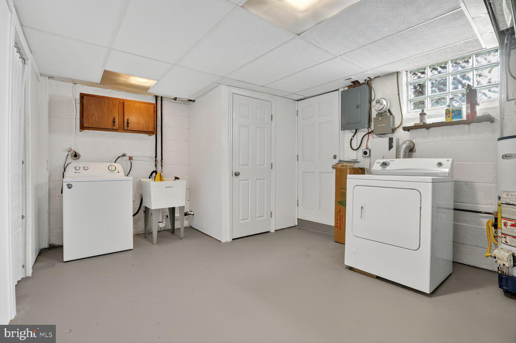 8258 Kavanagh Road Baltimore, MD 21222 - Photo 18 of 19 a utility room with dryer and washer