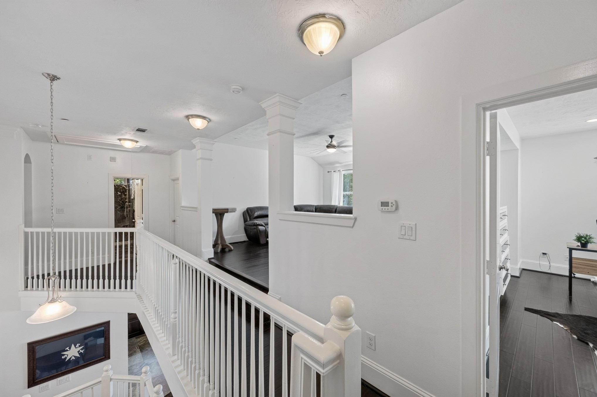 335 Voss Road Houston, TX 77024 - Photo 21 of 50 Bright upstairs landing overlooking downstairs.