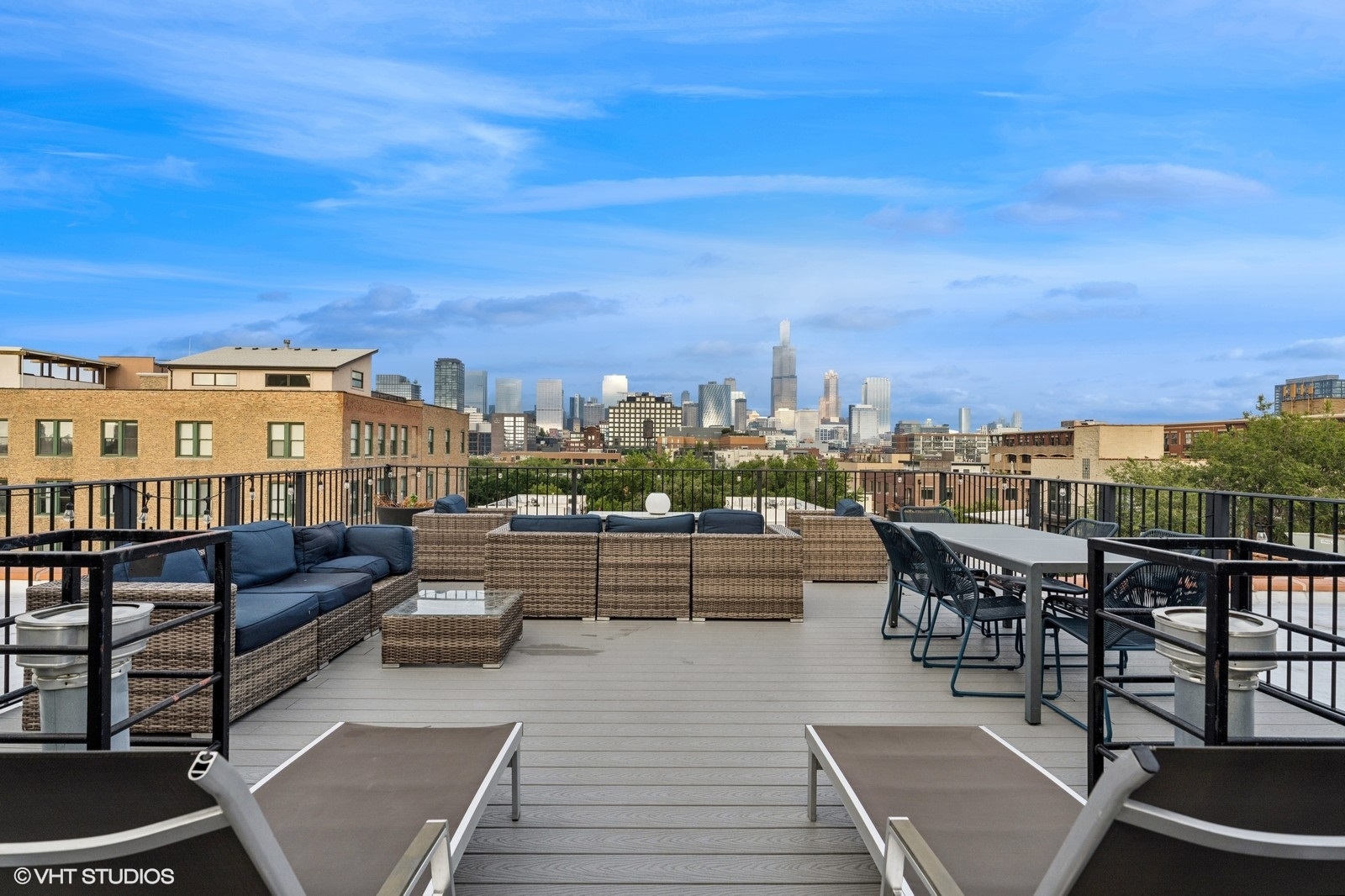 17 North Loomis Street, Unit 1C Chicago, IL 60607 - Photo 23 of 24 a view of a balcony with furniture and city view