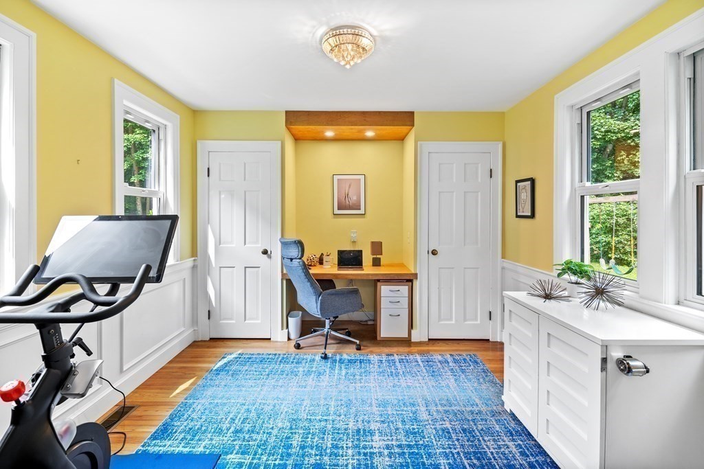 143 Boston Post Road Wayland, MA 01778 - Photo 6 of 17 a view of a workspace with furniture and a window