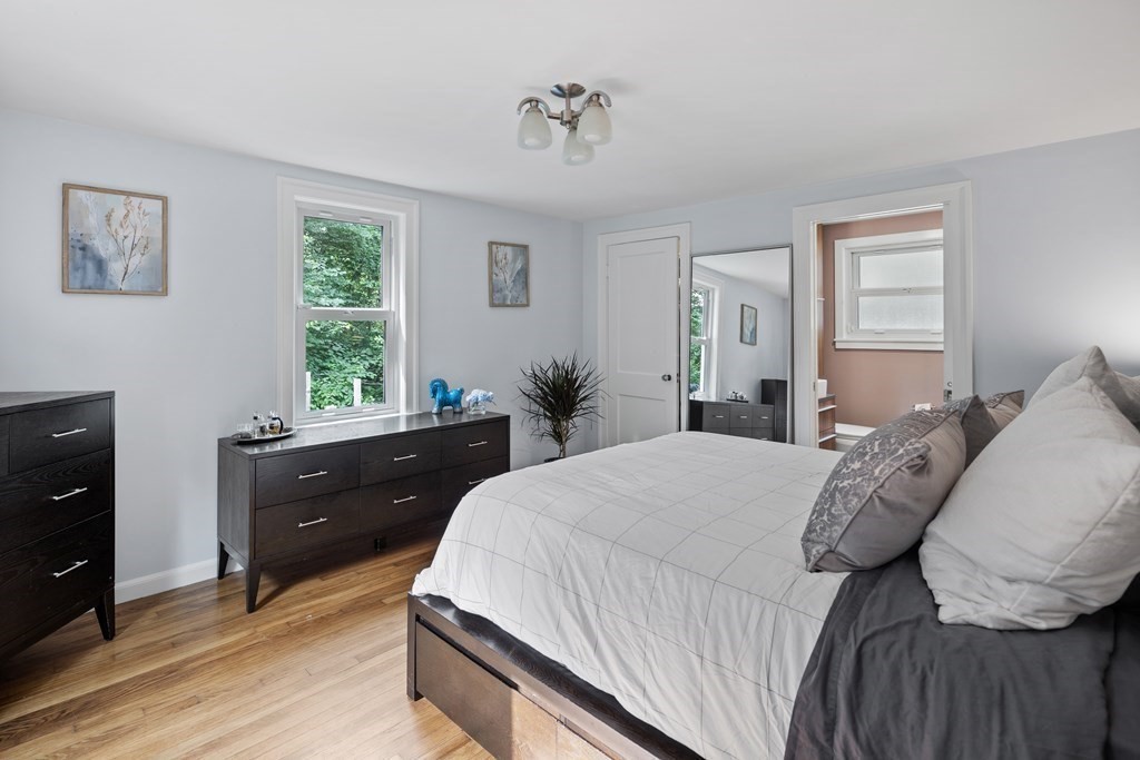 143 Boston Post Road Wayland, MA 01778 - Photo 7 of 17 a bedroom with a bed and a window
