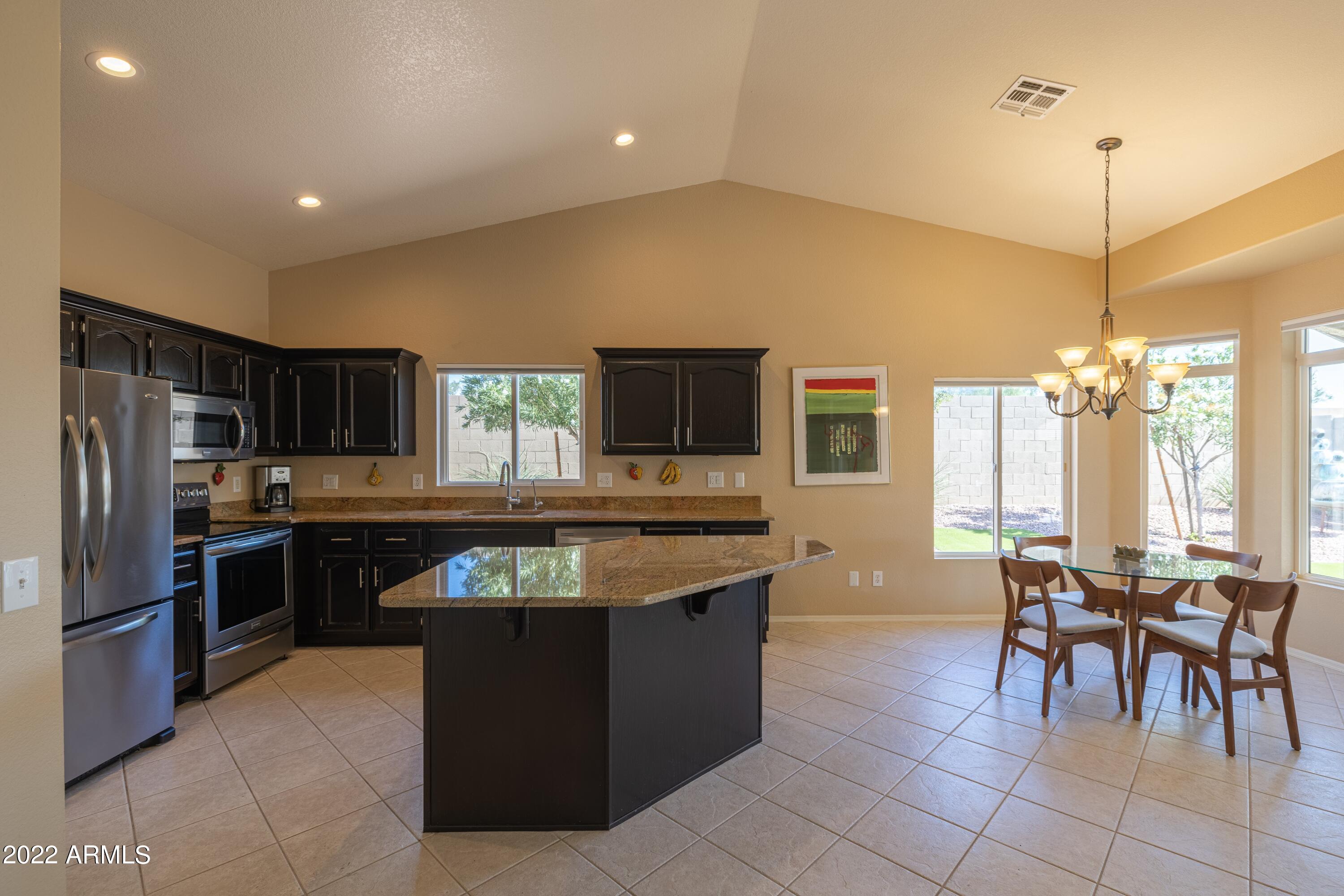 14844 Piccadilly Road Goodyear, AZ 85395 - Photo 6 of 31 007_KitchenDining
