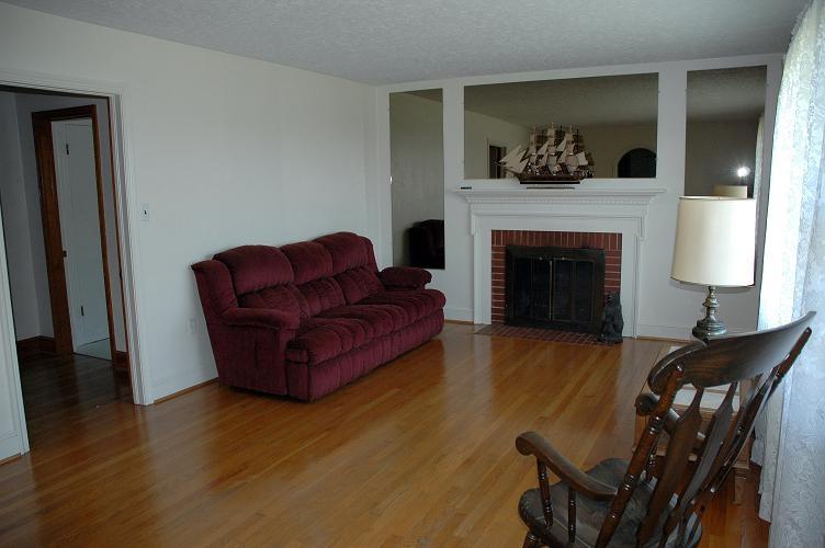 6229 Climax Road Chatham, VA 24531 - Photo 4 of 10 a living room with furniture and a fireplace
