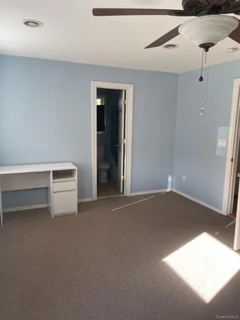 a view of empty room with windows