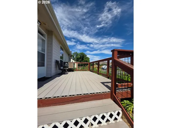 a view of a garden with wooden floor
