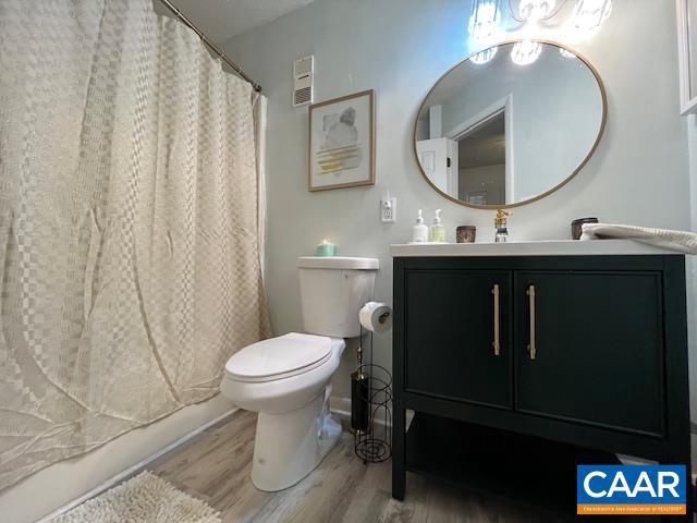 490 Three Ridges Roseland, VA 22967 - Photo 5 of 27 a bathroom with a toilet sink vanity granite and a mirror