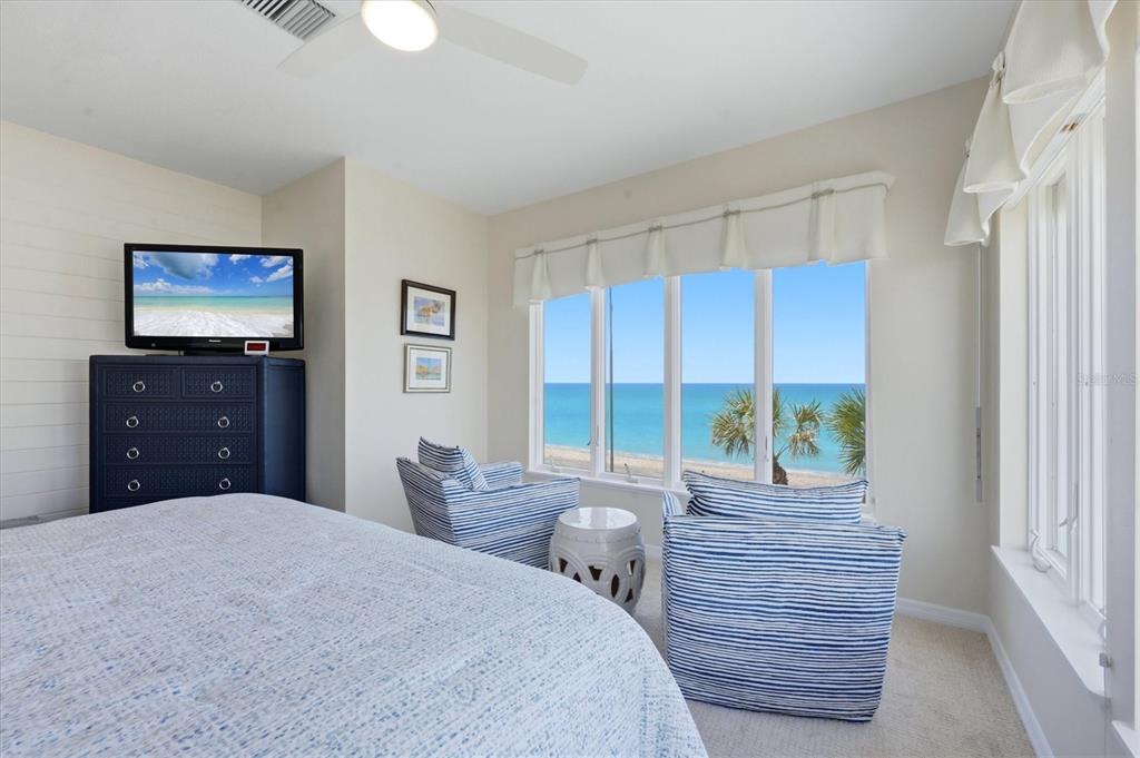 400 South Gulf Boulevard Boca Grande, FL 33921 - Photo 27 of 80 a bedroom with a bed and a dresser