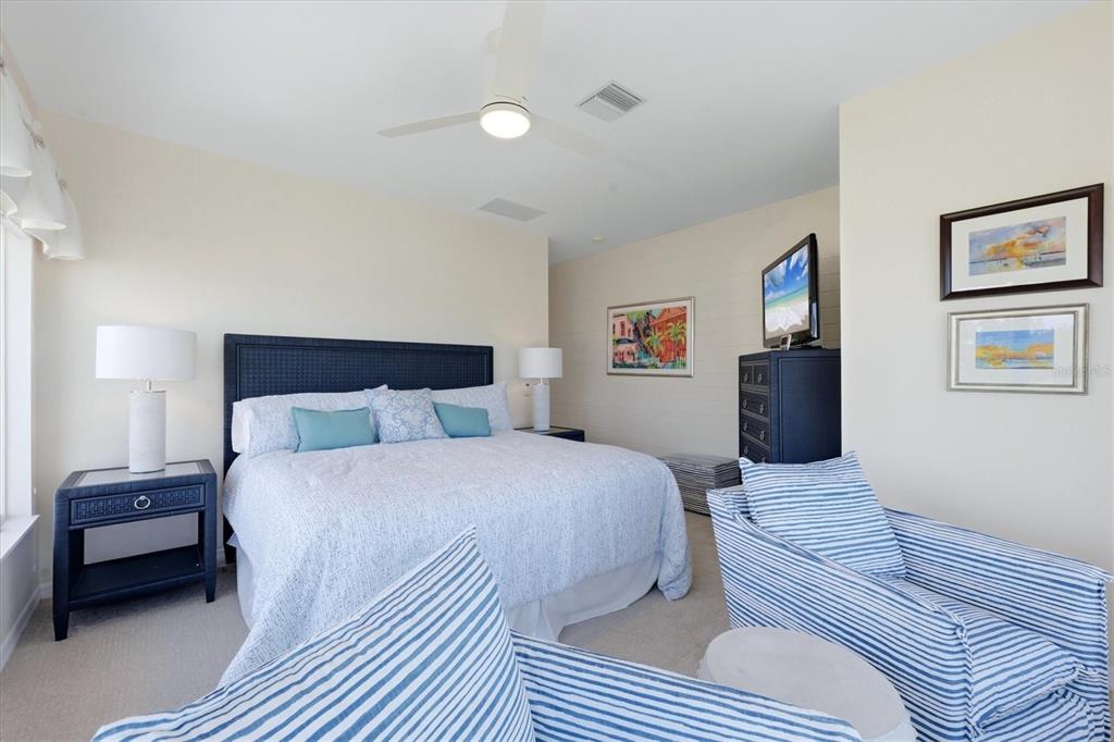 400 South Gulf Boulevard Boca Grande, FL 33921 - Photo 30 of 80 a bedroom with a bed and a night stand