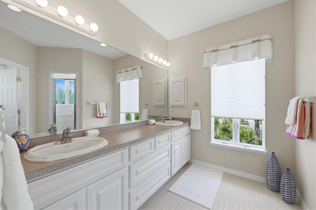 400 South Gulf Boulevard Boca Grande, FL 33921 - Photo 31 of 80 a bathroom with a sink and a mirror