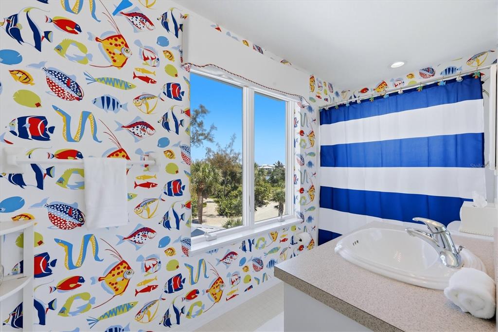 400 South Gulf Boulevard Boca Grande, FL 33921 - Photo 37 of 80 a bathroom with a sink and a bathtub