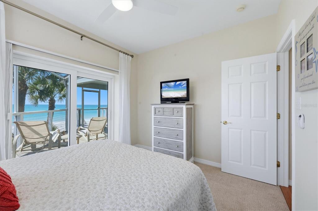 400 South Gulf Boulevard Boca Grande, FL 33921 - Photo 40 of 80 a bedroom with a bed and a television