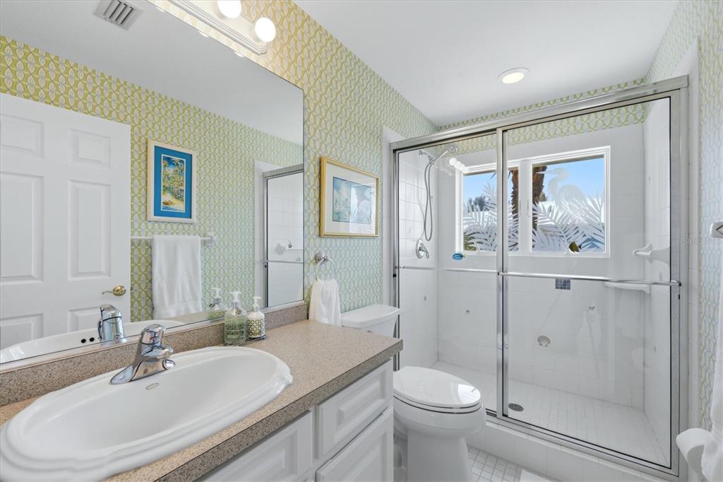 400 South Gulf Boulevard Boca Grande, FL 33921 - Photo 41 of 80 a bathroom with a sink toilet and shower