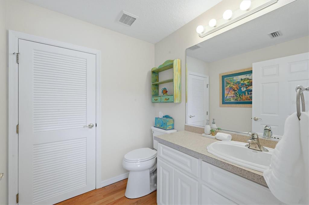 400 South Gulf Boulevard Boca Grande, FL 33921 - Photo 43 of 80 a bathroom with a sink toilet and vanity