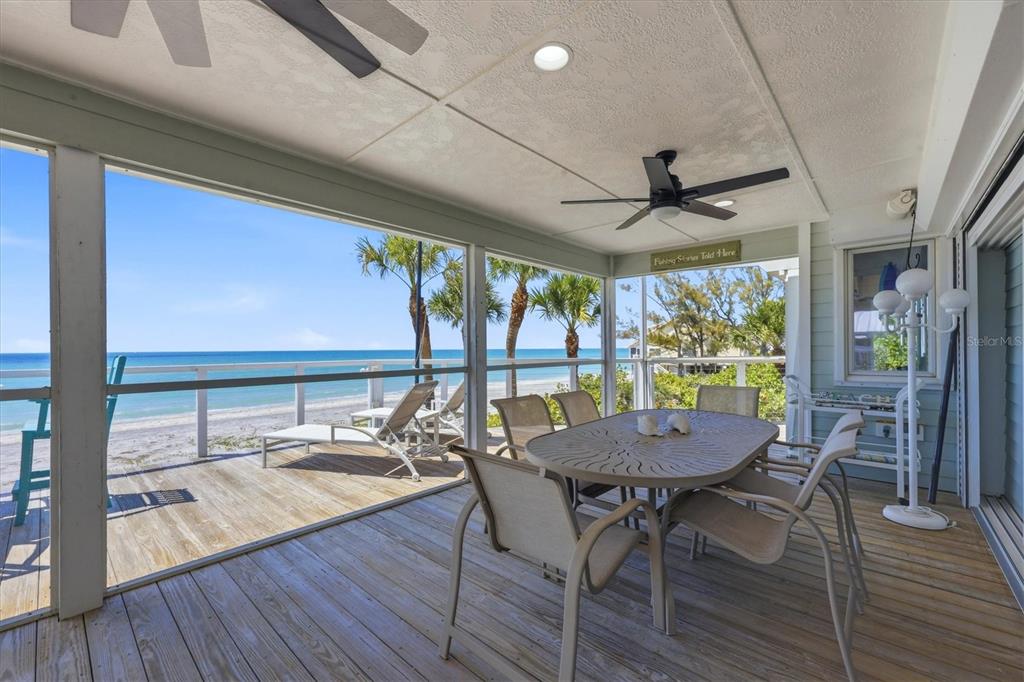 400 South Gulf Boulevard Boca Grande, FL 33921 - Photo 47 of 80 a view of a dining room with furniture window and wooden floor
