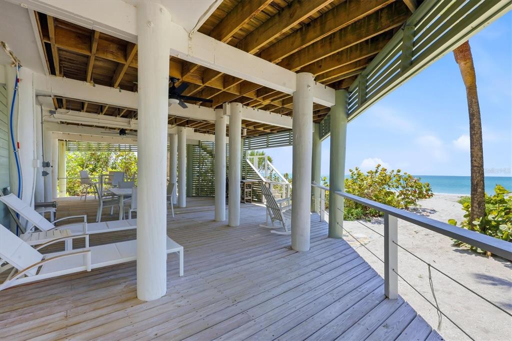 400 South Gulf Boulevard Boca Grande, FL 33921 - Photo 52 of 80 a view of a balcony with wooden floor