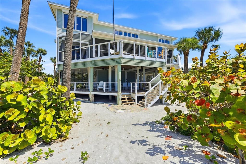 400 South Gulf Boulevard Boca Grande, FL 33921 - Photo 61 of 80 a view of a house with a yard and garden