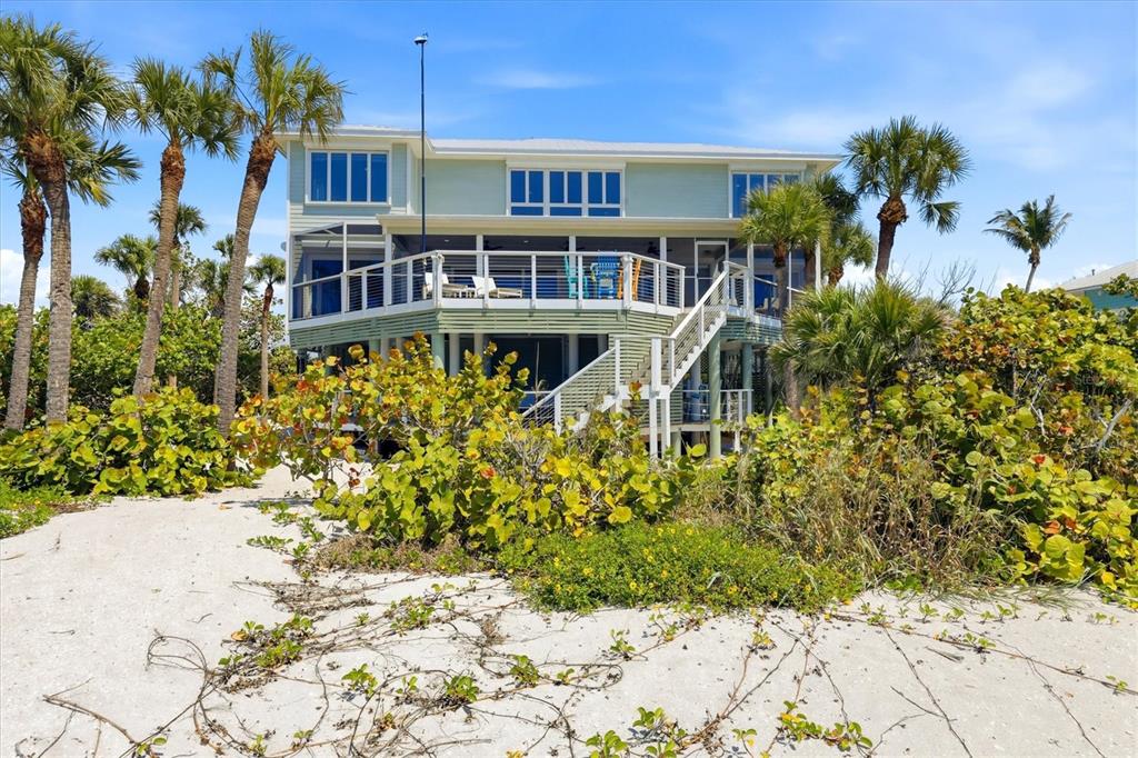 400 South Gulf Boulevard Boca Grande, FL 33921 - Photo 63 of 80 a view of a house with a yard and garden
