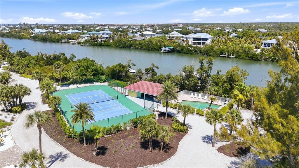 400 South Gulf Boulevard Boca Grande, FL 33921 - Photo 74 of 80 an aerial view of residential houses with outdoor space and lake view