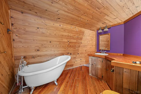 a bathroom with a sink and mirror