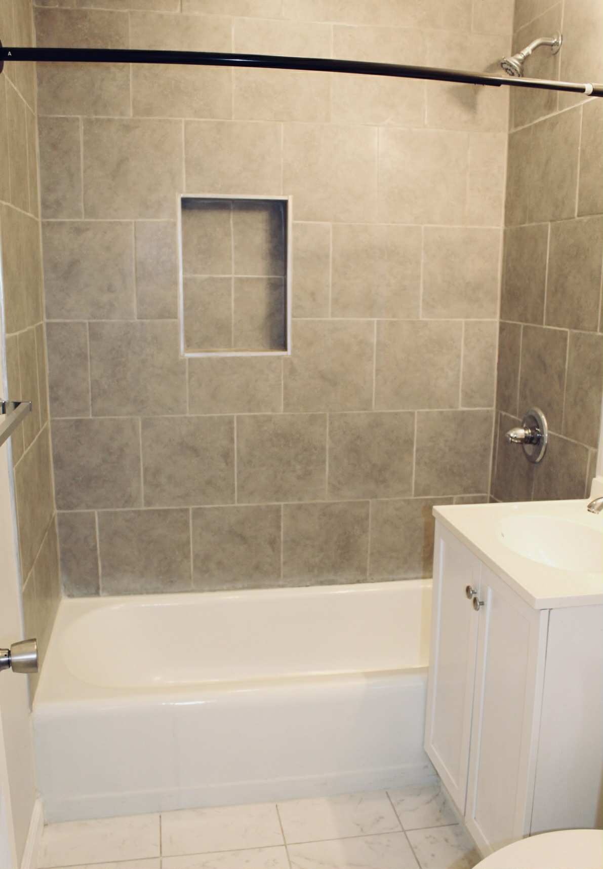 221 Burch Road Clarksville, TN 37042 - Photo 12 of 29 a bathroom with a shower and a bath tub