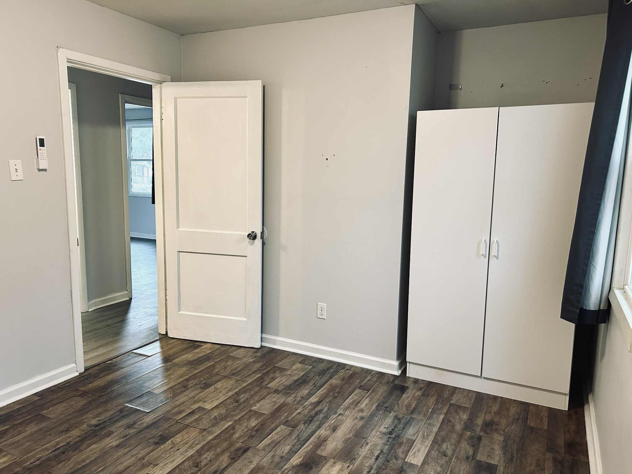 221 Burch Road Clarksville, TN 37042 - Photo 18 of 29 an empty room with wooden floor and entrance