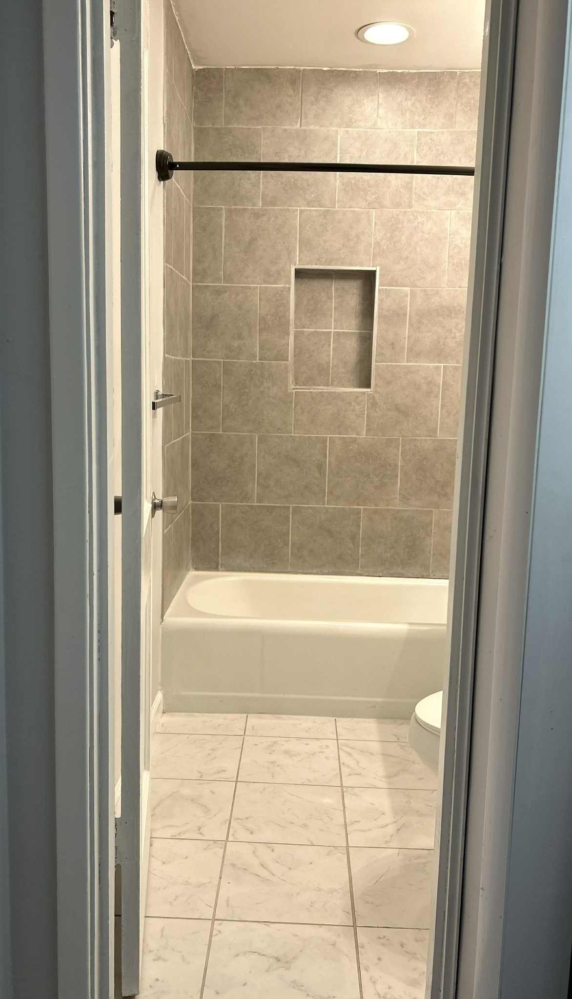 221 Burch Road Clarksville, TN 37042 - Photo 9 of 29 a bathroom with a shower and a bath tub