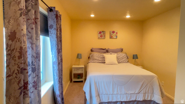1797 Sunset Road Enoch, UT 84721 - Photo 41 of 80 Bedroom featuring wall-to-wall carpeting, recessed ceiling lighting, a window with blinds, and light-colored walls