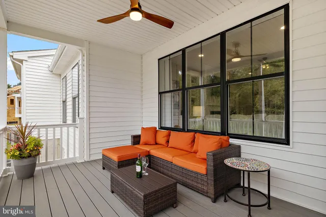 a blue bench sitting in front of a window