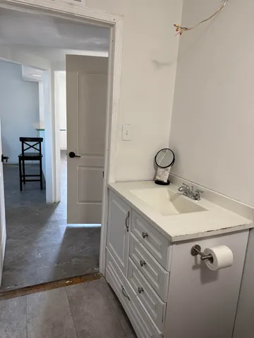 a view of storage and utility room with washer and dryer
