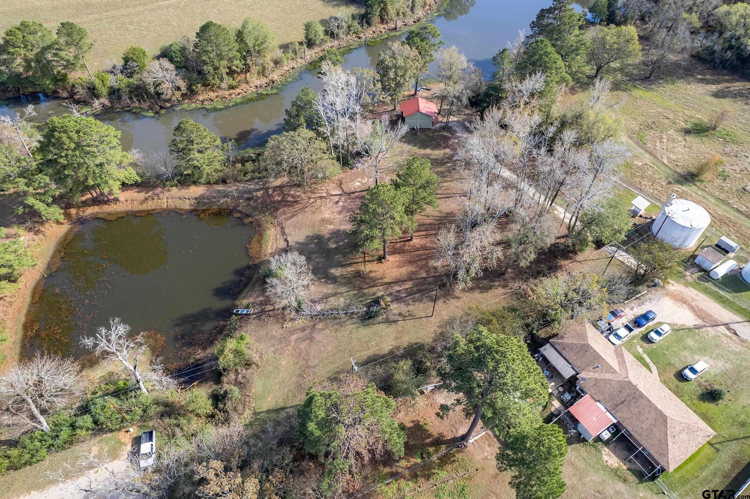 197 Cr 2304 Rusk Tx 75785 Rusk, TX 75785 - Photo 12 of 33 an aerial view of a house with a yard