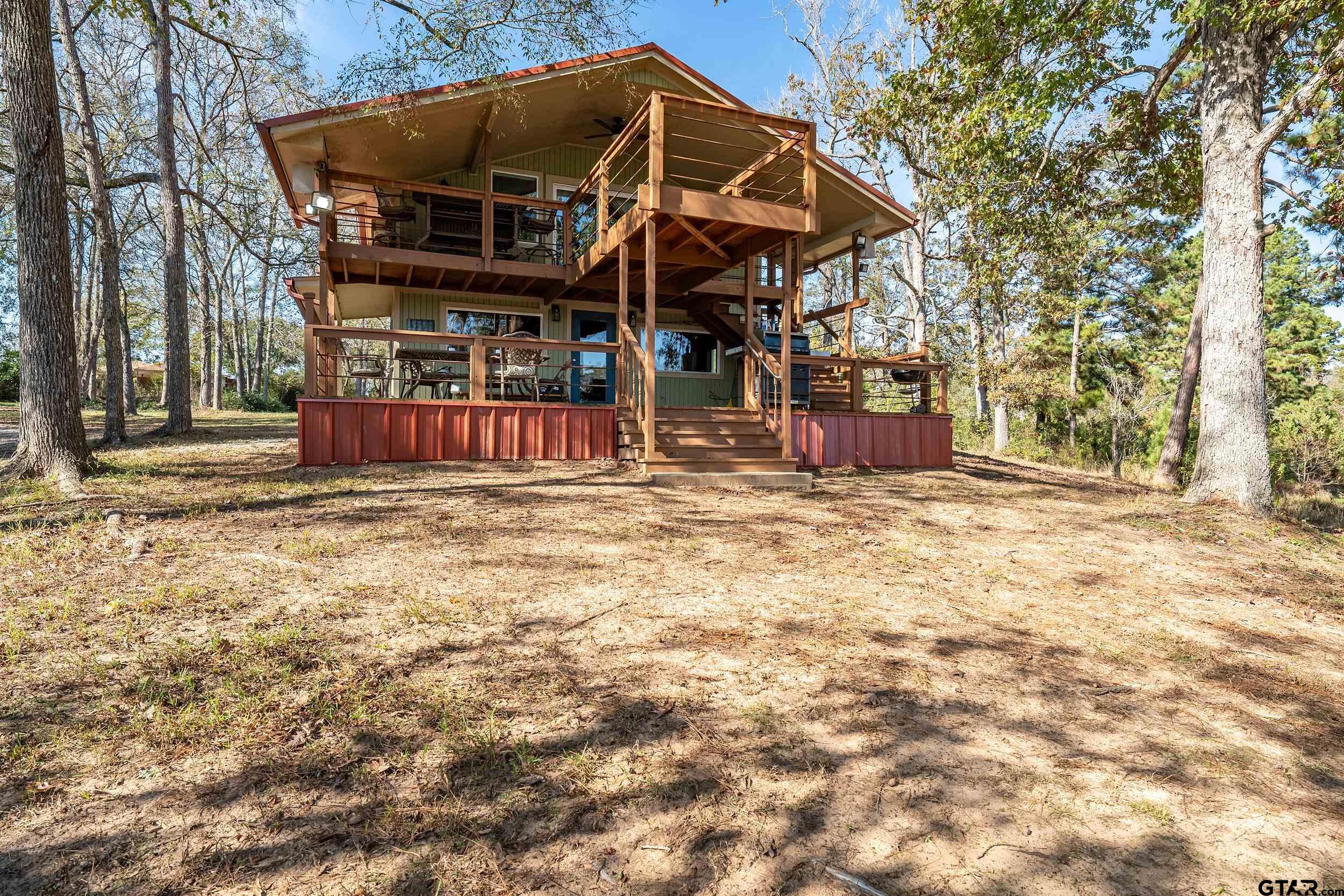 197 Cr 2304 Rusk Tx 75785 Rusk, TX 75785 - Photo 17 of 33 a view of a chairs and table in the patio