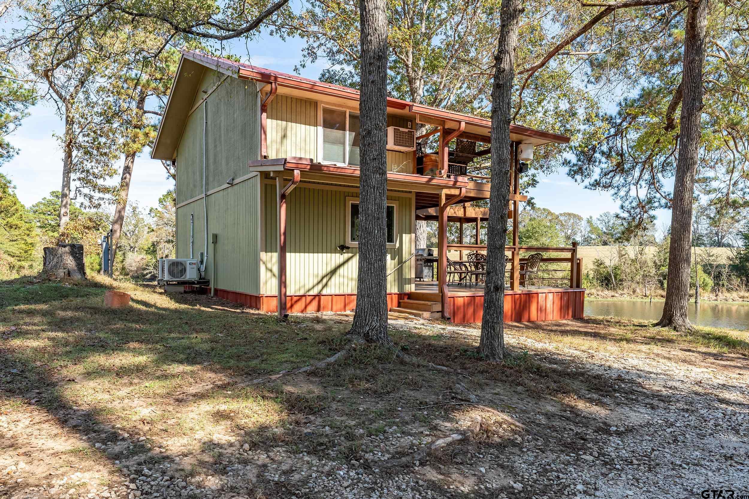 197 Cr 2304 Rusk Tx 75785 Rusk, TX 75785 - Photo 2 of 33 a view of street with large trees