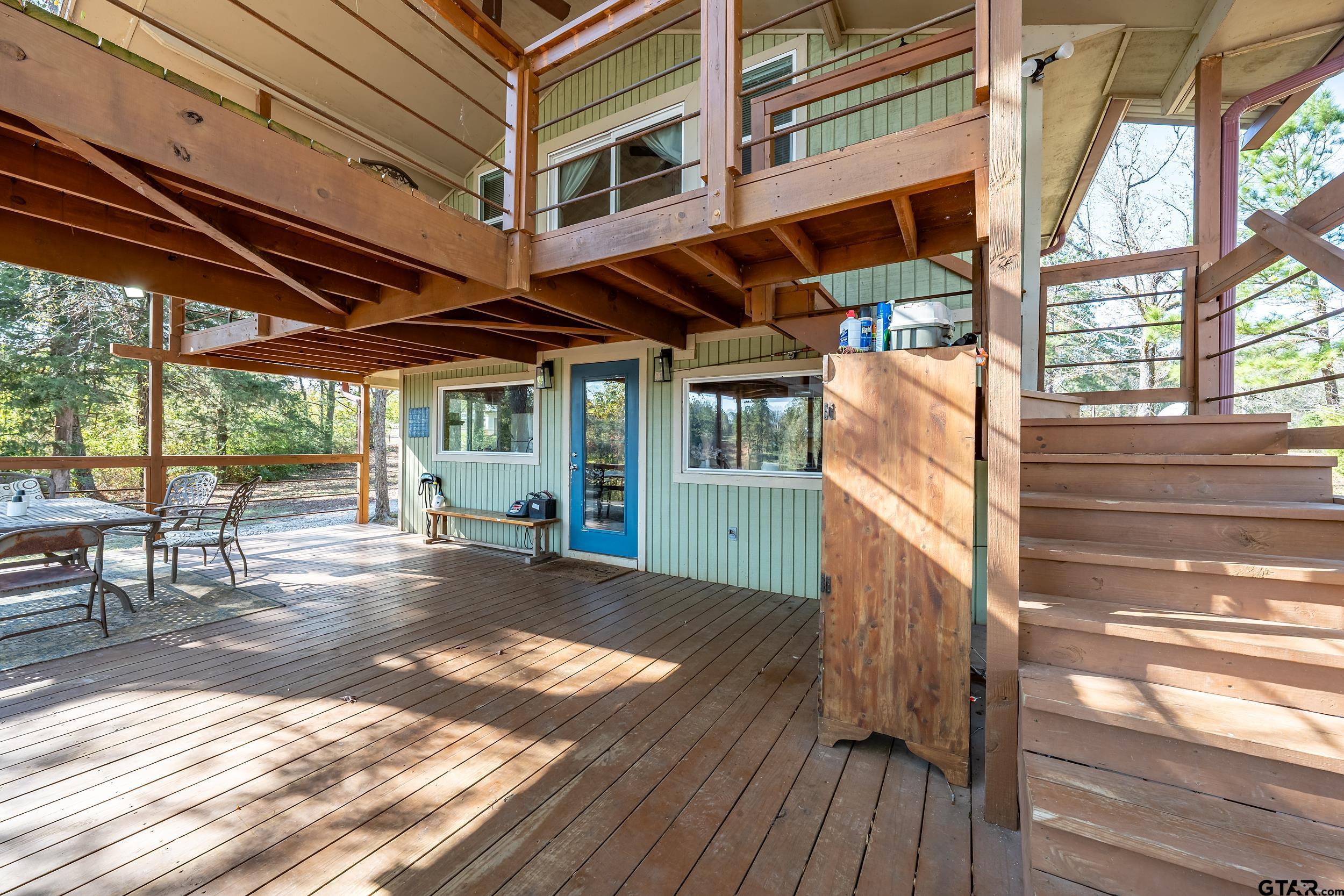 197 Cr 2304 Rusk Tx 75785 Rusk, TX 75785 - Photo 21 of 33 a view of a backyard with sitting area