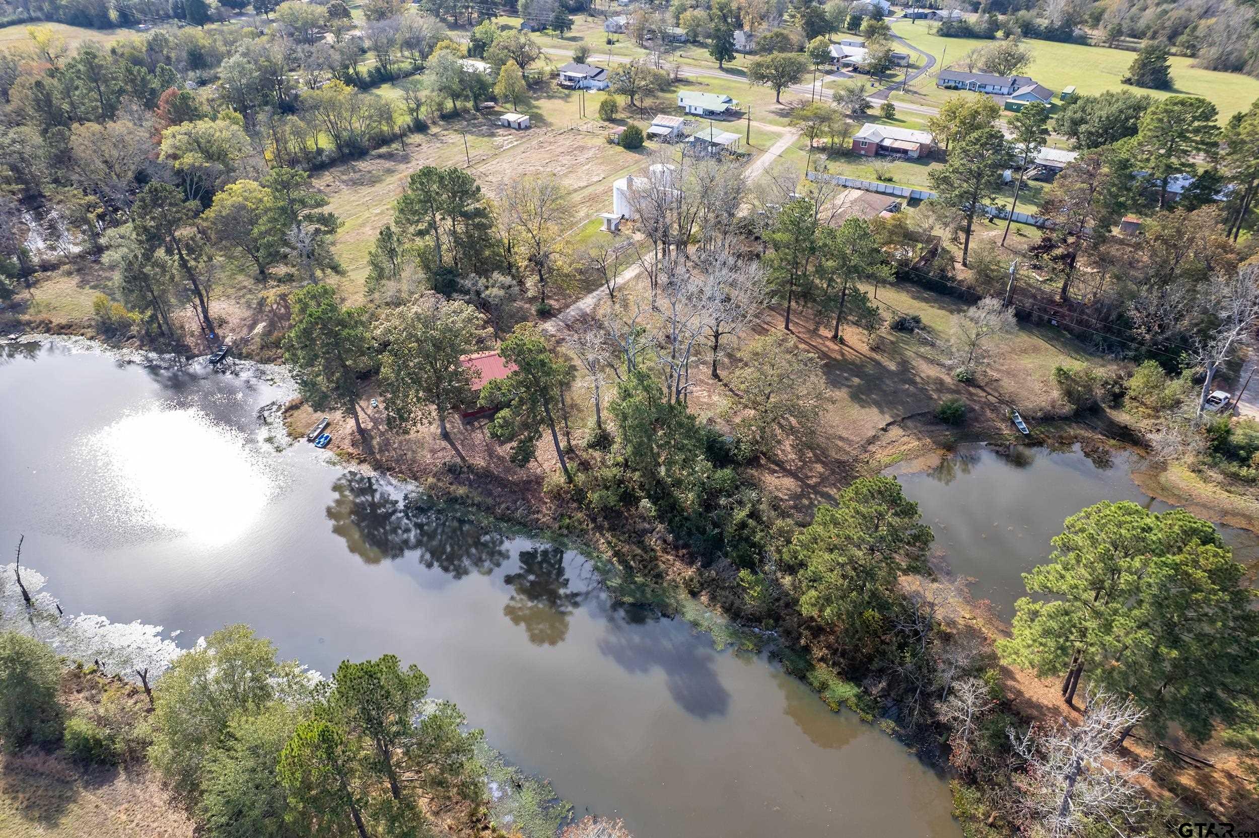 197 Cr 2304 Rusk Tx 75785 Rusk, TX 75785 - Photo 7 of 33 a view of a lake with a forest