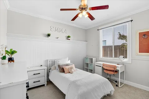 a bathroom with a sink toilet a mirror and shower