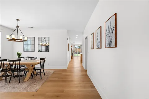 a view of a livingroom with furniture and wooden floor