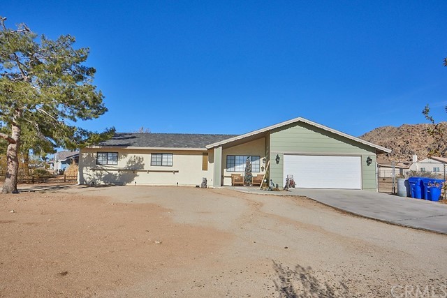 16909 Ouray Road Apple Valley, CA 92307 - Photo 1 of 1 a view of a house with a outdoor space